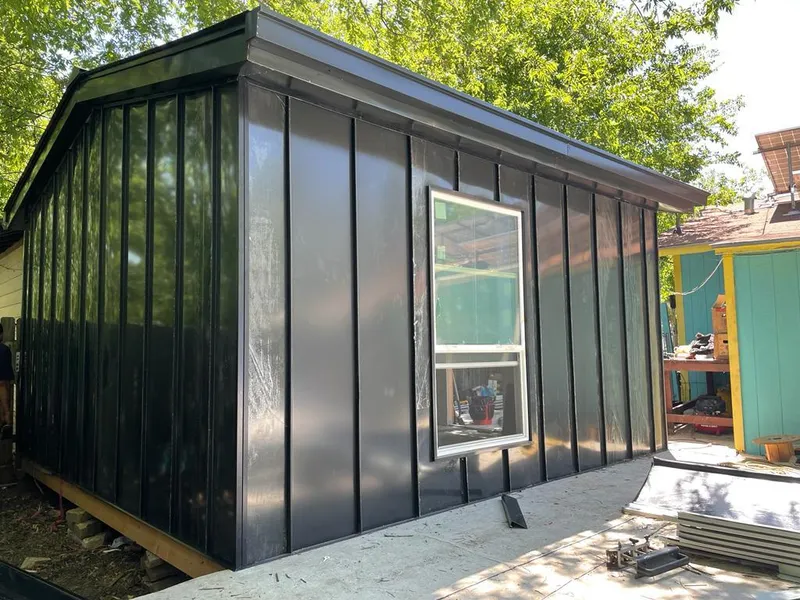 Black standing seam metal wall panels for Roof Inspection in Wayne